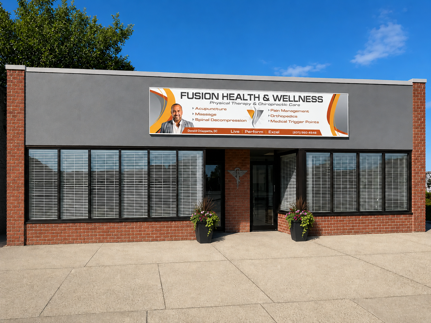 Exterior of the West Babylon chiropractic office with flower planters